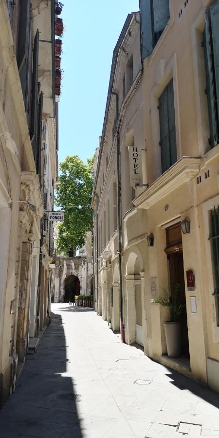 Hotel De L'Amphitheatre Nimes Bagian luar foto