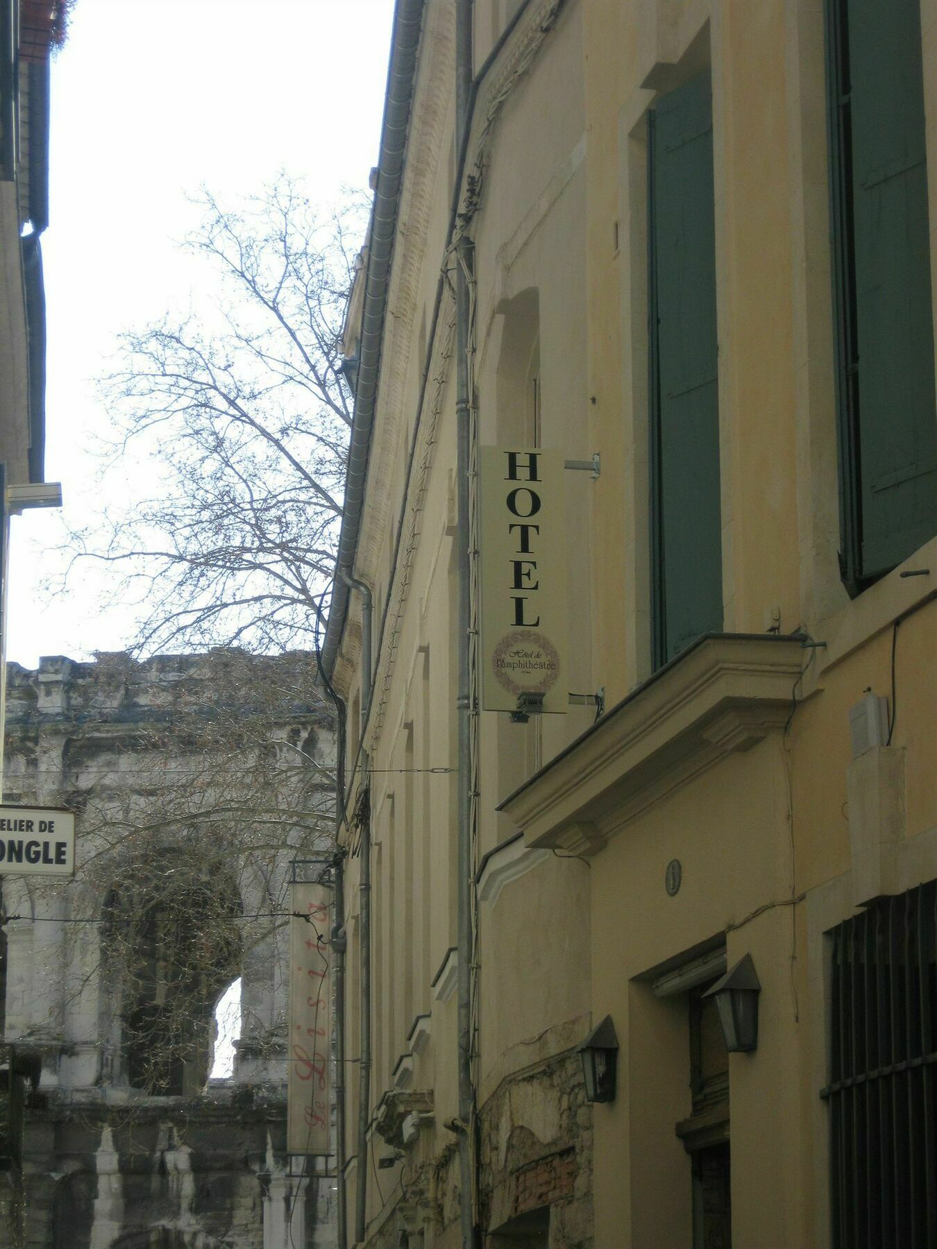 Hotel De L'Amphitheatre Nimes Bagian luar foto